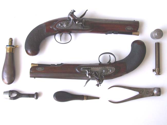 A Cased pair of English Flintlock 'Gentleman's' Traveling Pistols by Thomas Mortimer, GUNMAKER TO HIS MAJESTY, London, circa 1810-1815. — image 2